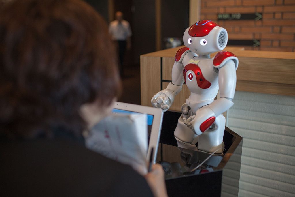 SASEBO, JAPAN - JULY 15: A robotic concierge handles guests questions at the Henna Hotel (Weird Hotel) in Huis Ten Bosch, Netherlands themed amusement park on July 15, 2015 in Sasebo, Japan. The Henna Hotel, scheduled to open on July 17, features multi-lingual humanoid robots that greet visitors while other robots serve coffee and do the cleaning, as well as room doors that are opened by face-recognition technology.  (Photo by Trevor Williams/WireImage)