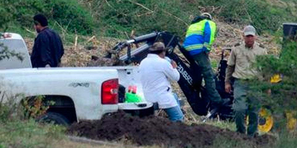 Localizan dos cuerpos y 15 posibles fosas en Iguala
