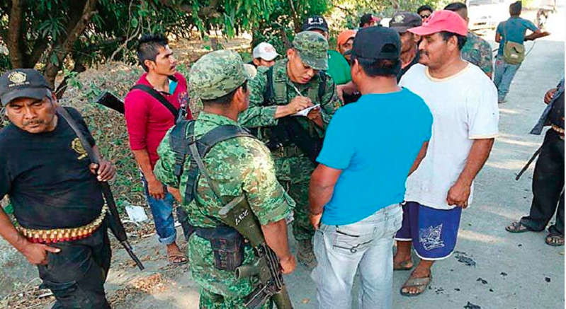 Comunitarios rescatan a 10 secuestrados en Cocula