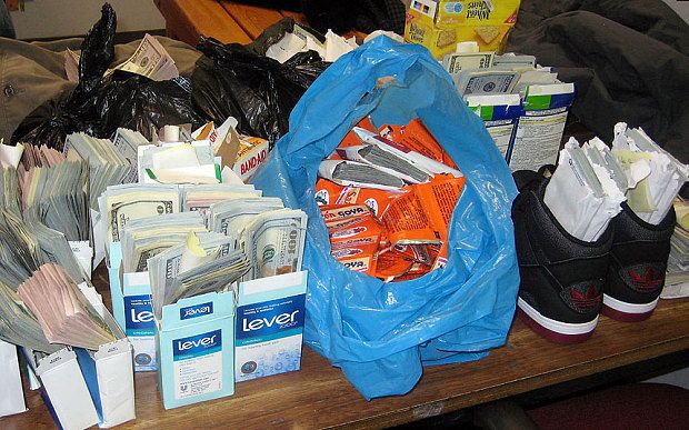 Pasajero detenido por ocultar 11 mdp en su maleta Pasajero detenido por ocultar 11 mdp en su maleta