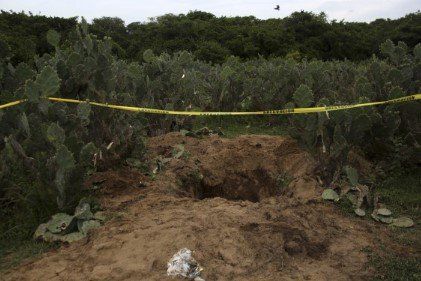 Encuentran 5 cuerpos en fosas de Iguala Encuentran 5 cuerpos en fosas de Iguala