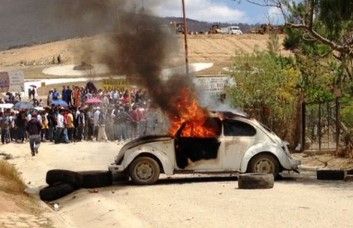 Incendian vehículo en basurero de Oaxaca