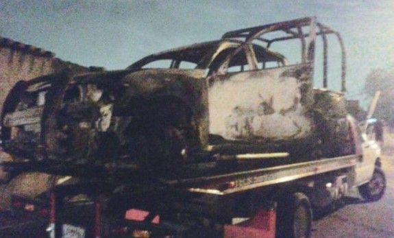 Queman 2 patrullas en Coyotepec