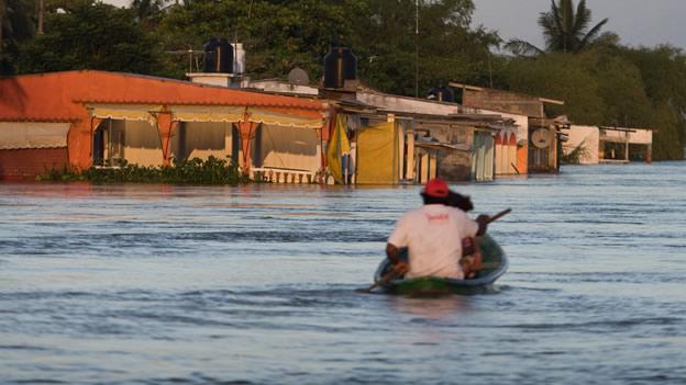 Javier Duarte debe 368 mdp a la Comisión Nacional de Vivienda - lluvias-2010-veracruz-CNN