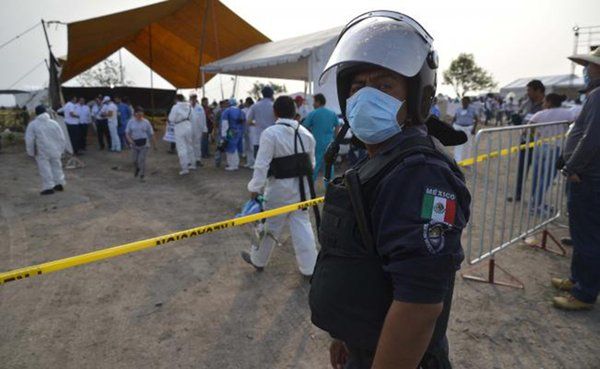 Suman 84 los cuerpos exhumados en Tetelcingo