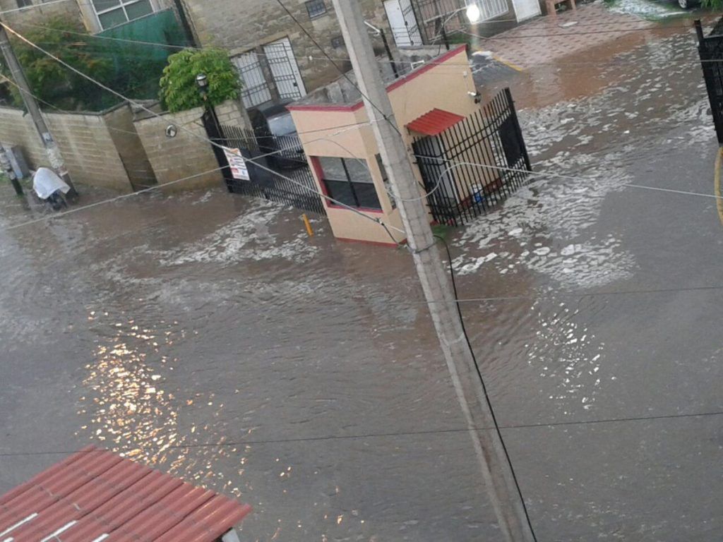 Inundaciones en Puebla y Guadalajara - Geovillas-del-Sur-adrian-bicho-3-1024x768