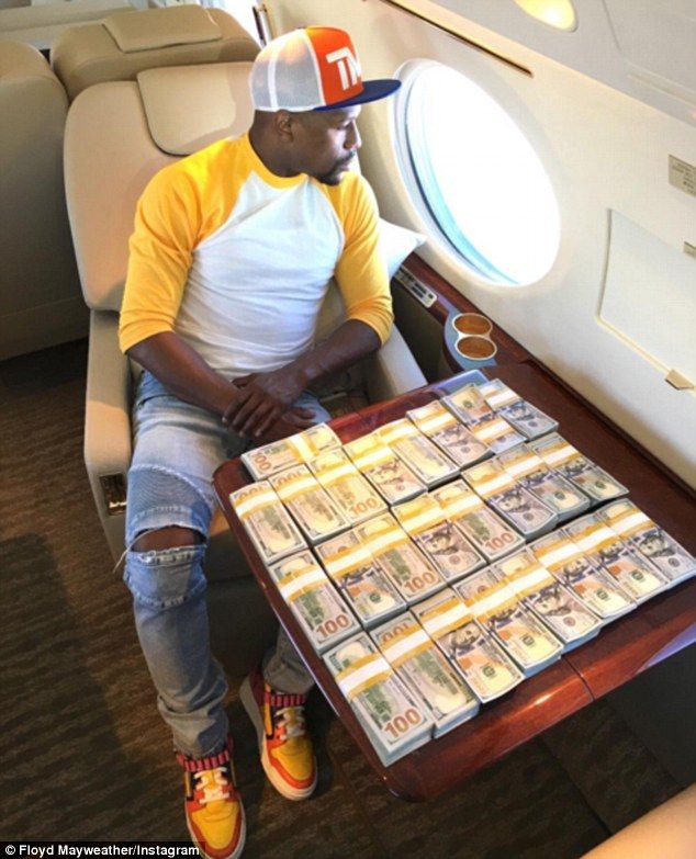 Los atletas mejor pagados de la historia - floyd-mayweather-dinero
