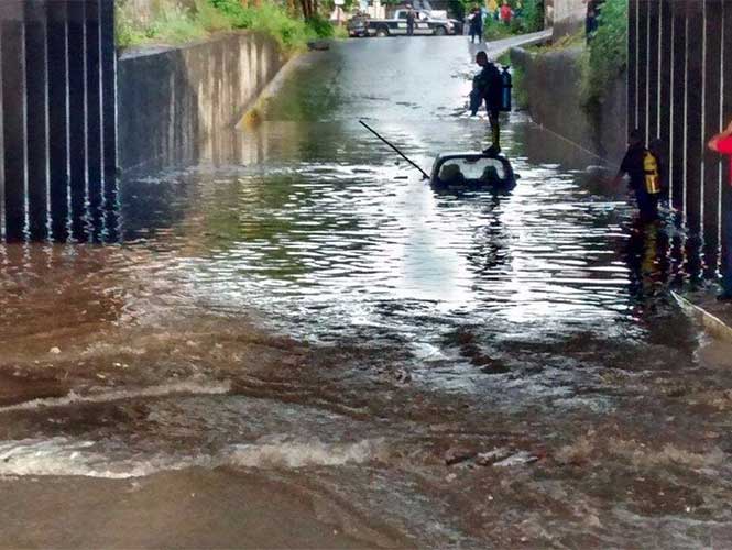 Muere mujer ahogada en encharcamiento en Morelos - auto-inundado