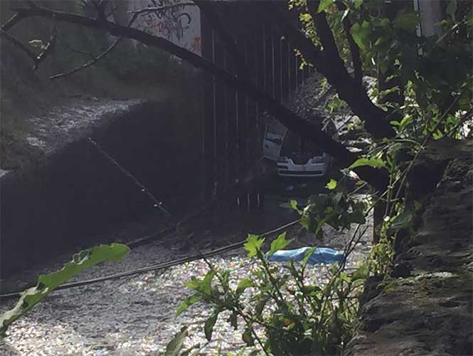 Muere mujer ahogada en encharcamiento en Morelos - auto-inundado2