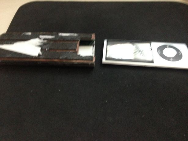 Alertan por robo en cajeros usando iPods - ipod-cajero