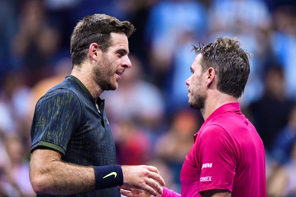 Del Potro se emociona hasta las lágrimas en pleno partido - Wawrinka-1-AFP