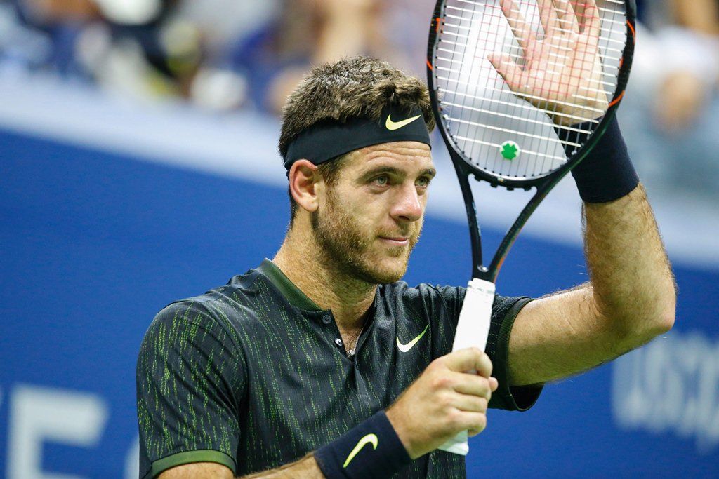 Del Potro se emociona hasta las lágrimas en pleno partido - Wawrinka-2-AFP