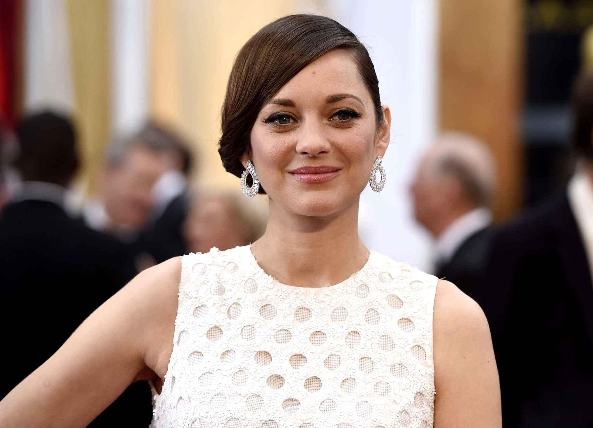 Marion Cotillard desmiente romance con Brad Pitt