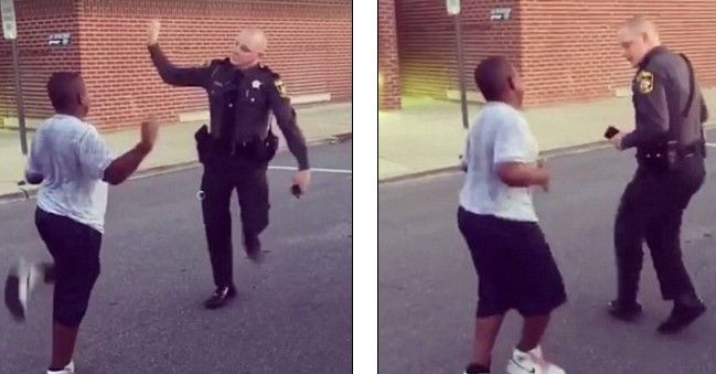 #Viral niño reta a policía a una batalla de baile