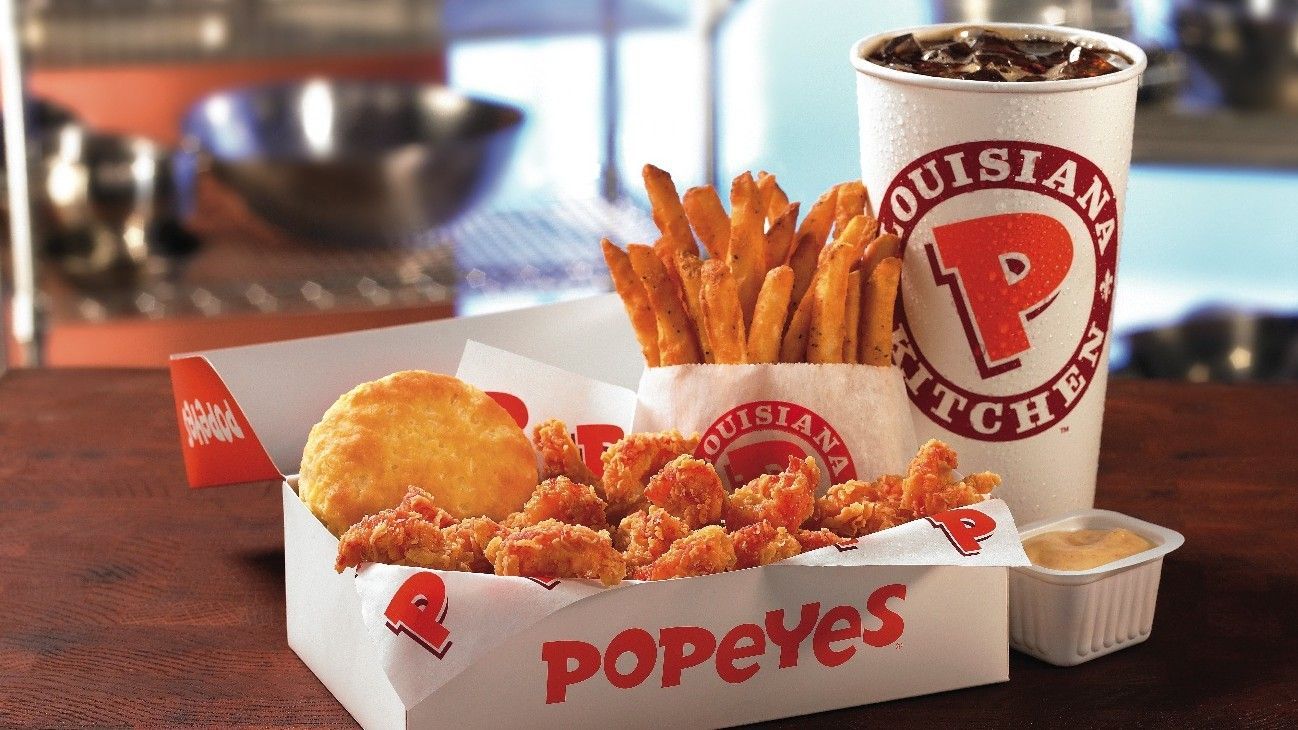 Compañía dueña de Burger King compra Popeyes