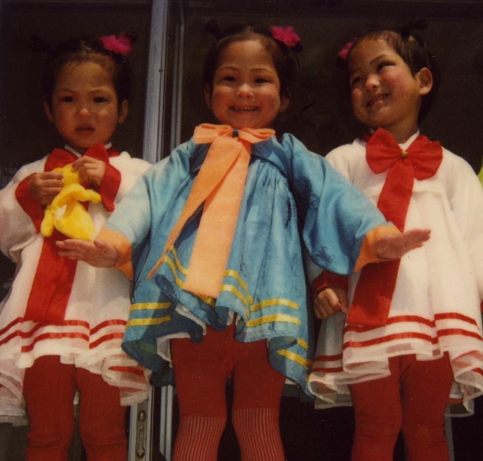 Fotógrafo revela cómo era la vida en Corea del Norte antes de los smartphones - trillizos-cdn2-e1493314690758