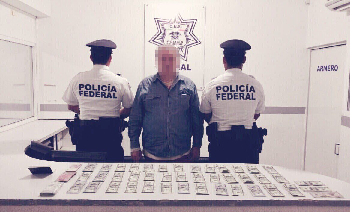 Detienen a hombre por ingresar efectivo en aeropuerto de Cancún