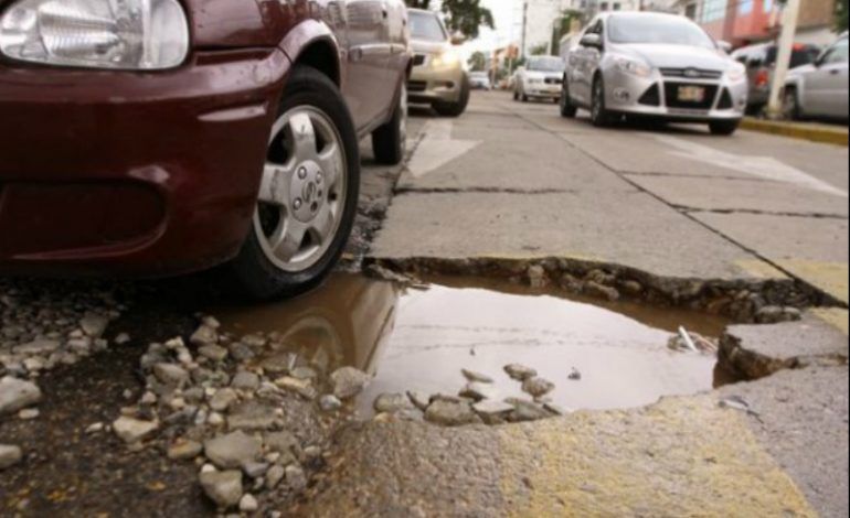¿Cómo reportar un bache y cobrar una indemnización? - bache