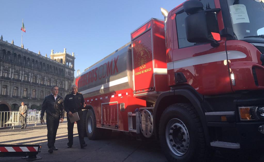 Jefe Vulcano y líder sindical de bomberos arreglan diferencias