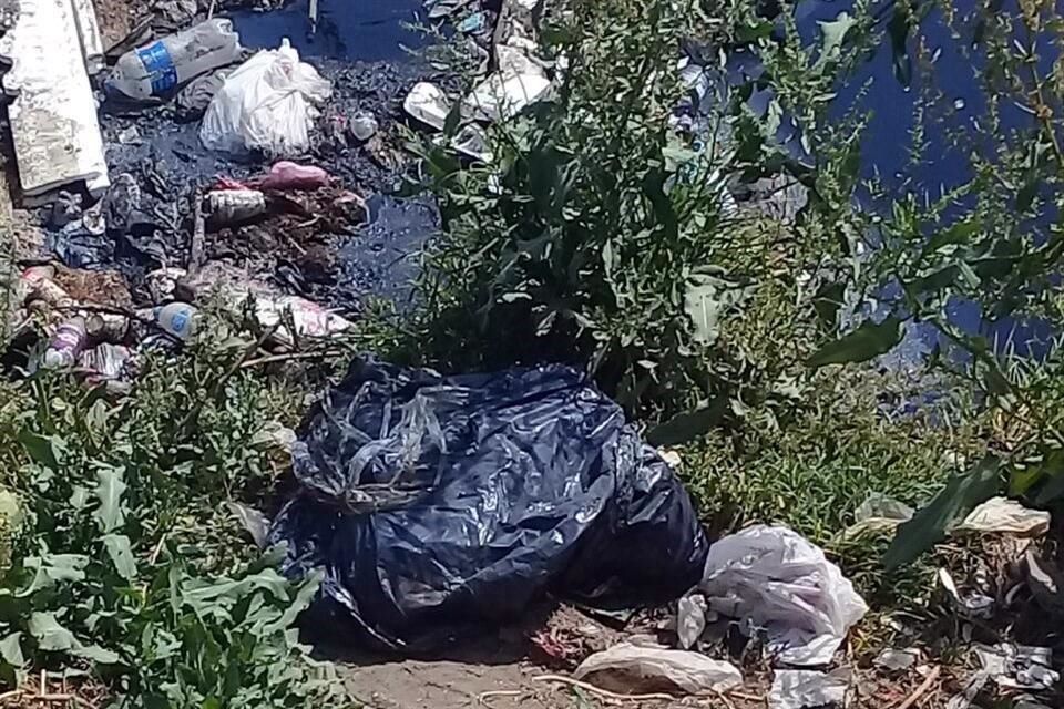 Hallan bolsas con restos humanos en Ecatepec