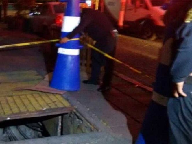 Mujer y su hijo caen a registro perteneciente a la CFE