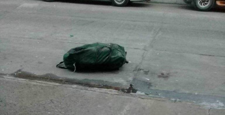 Hallan restos humanos en una maleta en Apatzingán