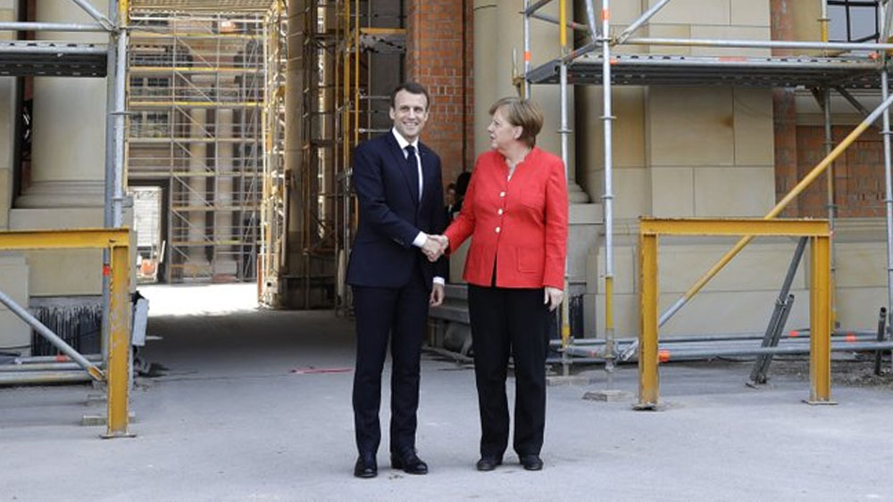 Macron se reúne con Merkel