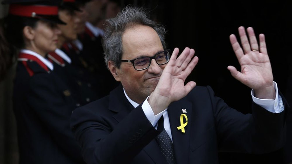 Nuevo presidente catalán incluye presos y exiliados en su gobierno