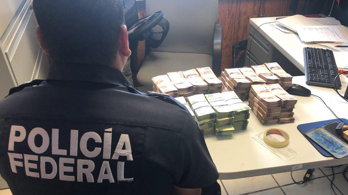 Detienen a funcionarios de Acapulco con armas y 3 millones de pesos - funcionarios-arma-dinero-acapulco