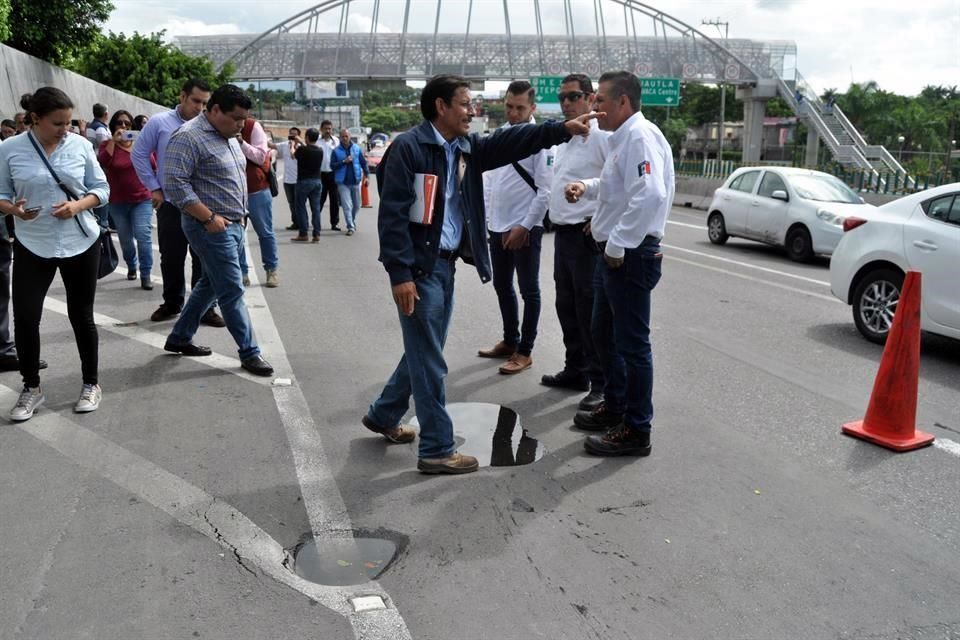 Baches en acceso a Puente Palmira. SCT descarta riesgo - hundimientos-puente-palmira