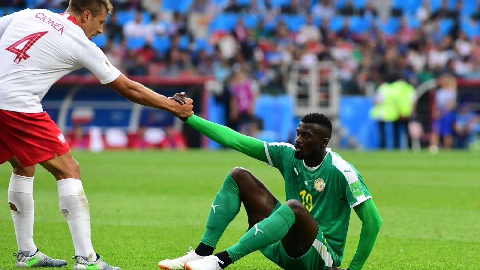 La foto del Polonia vs Senegal que dio la vuelta al mundo - partido-senegal-polinia-manos-mundial-rusia-2018-2