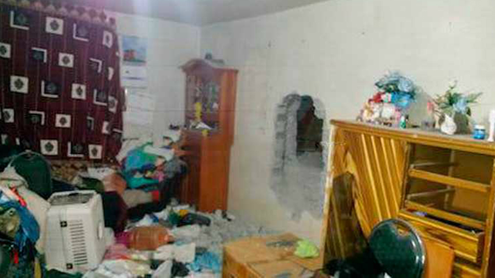 Abren hoyo en vivienda para robar en tienda Elektra en el Edomex