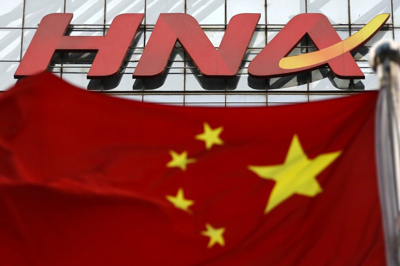 Muere presidente de conglomerado chino tras caer al tomarse fotos - hna