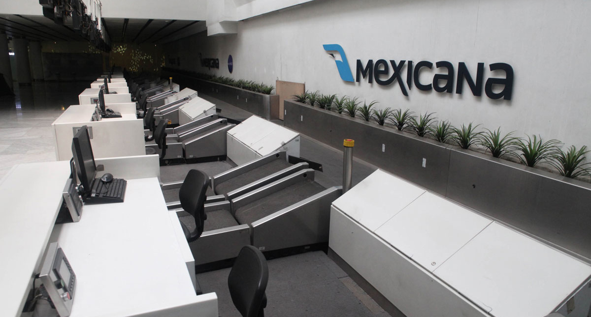 Sindicatos pactan liquidación de empleados de Mexicana de Aviación