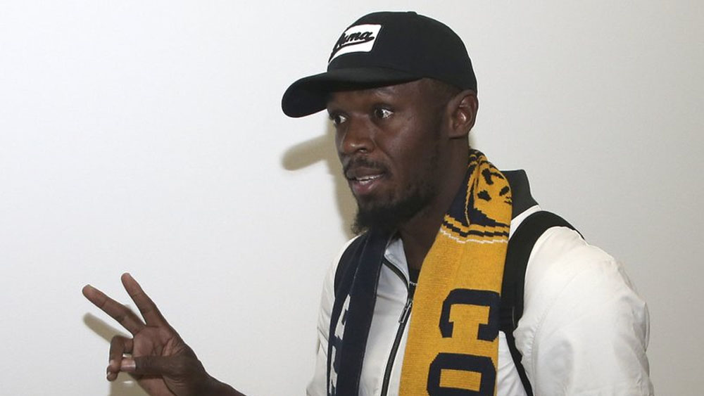 Usain Bolt llega a Australia para entrenar con equipo de futbol local