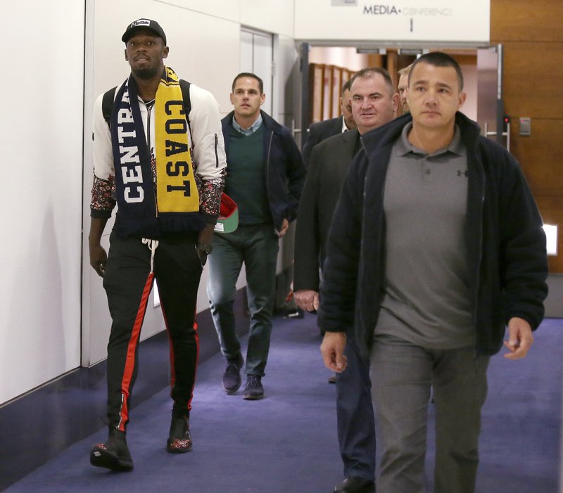 Usain Bolt llega a Australia para entrenar con equipo de futbol local - bolt-australia2