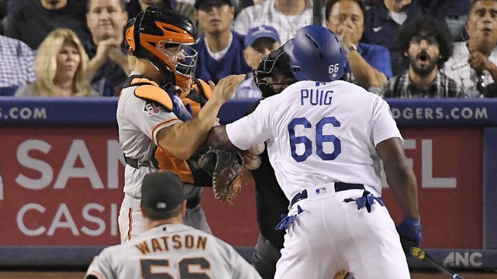 Suspenden dos partidos a Yasiel Puig por iniciar riña
