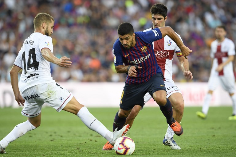 El Barcelona vence 8-2 al Huesca y alcanza el liderato en LaLiga - 000-18t0fo