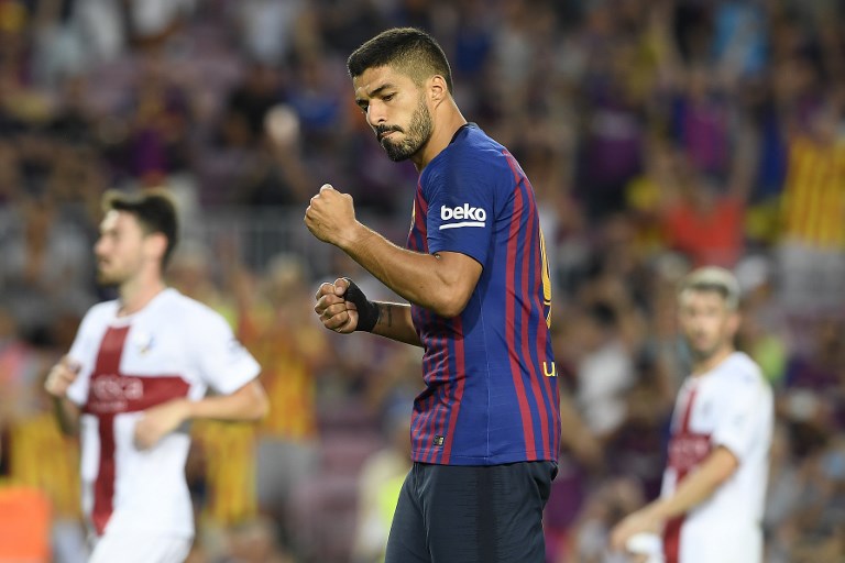 El Barcelona vence 8-2 al Huesca y alcanza el liderato en LaLiga - 000-18t0l1