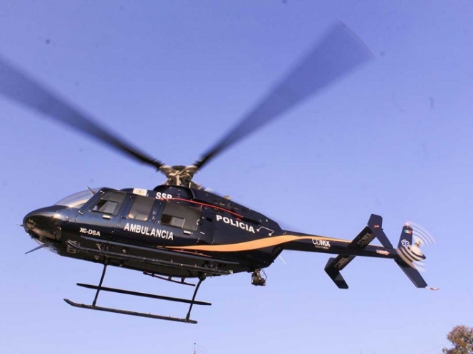 Trasladan a mujer en helicóptero luego de que le cayera una maceta en la cabeza - helicoptero-condor