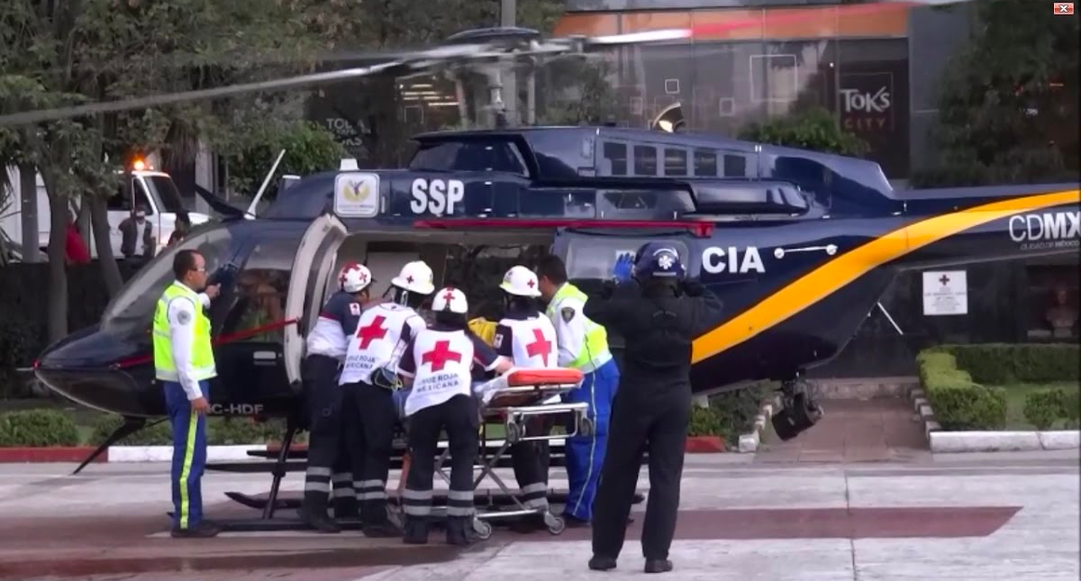 Trasladan a mujer en helicóptero luego de que le cayera una maceta en la cabeza