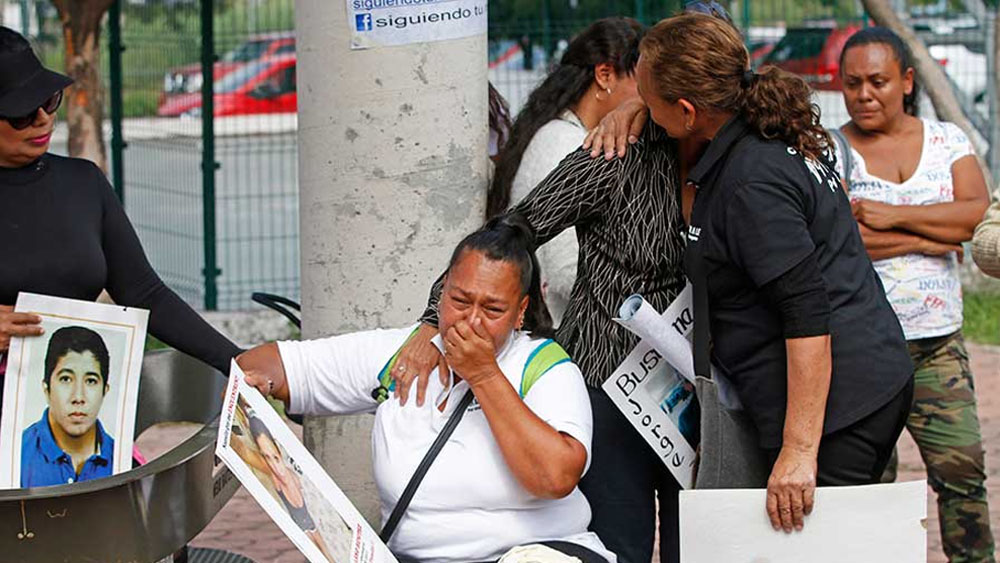 Familiares de desaparecidos protestan por trato indigno a cadáveres en Jalisco Familiares de desaparecidos protestan por trato indigno a cadáveres en Jalisco