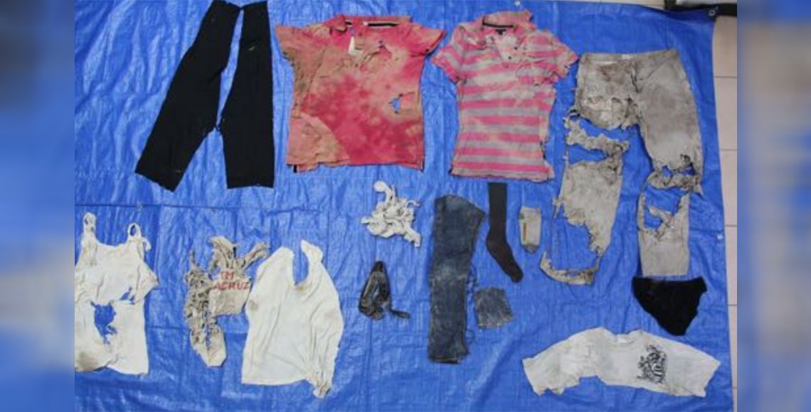 Con ropa extraída de fosas buscan identificar desaparecidos en Veracruz - ropa-2