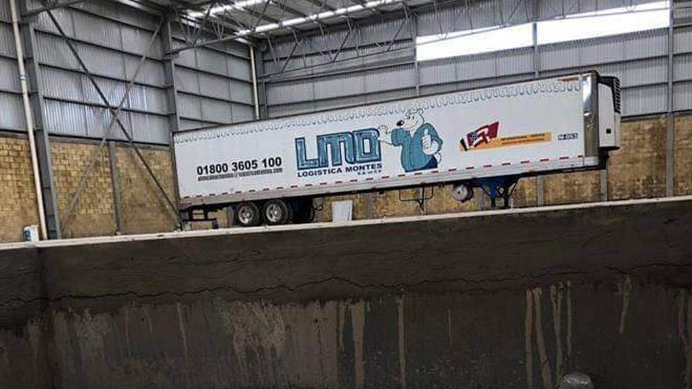 Tráiler con cuerpos irá al Instituto Jalisciense de Ciencias Forenses