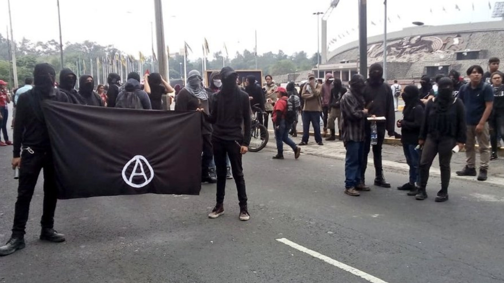 Presuntos anarquistas fueron los que ocasionaron cierre de Insurgentes en marcha de la UNAM