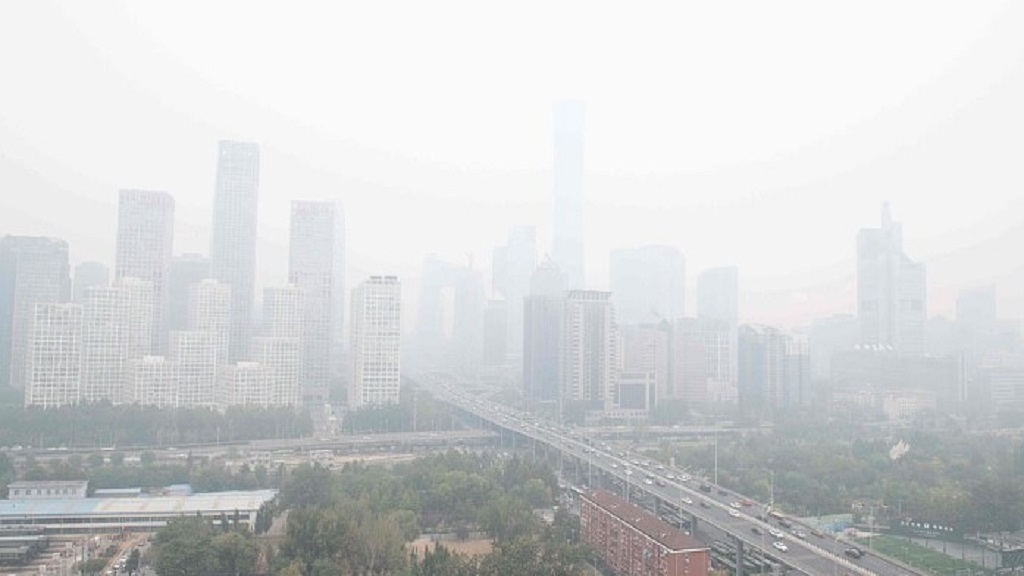 El antes y después de la acumulación de smog tóxico en Beijing - beijings-central-business-district-1