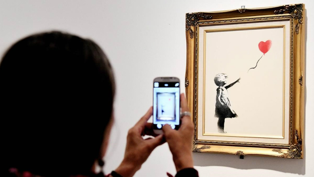 Pintura de Banksy que se autodestruyó vale el doble que la original