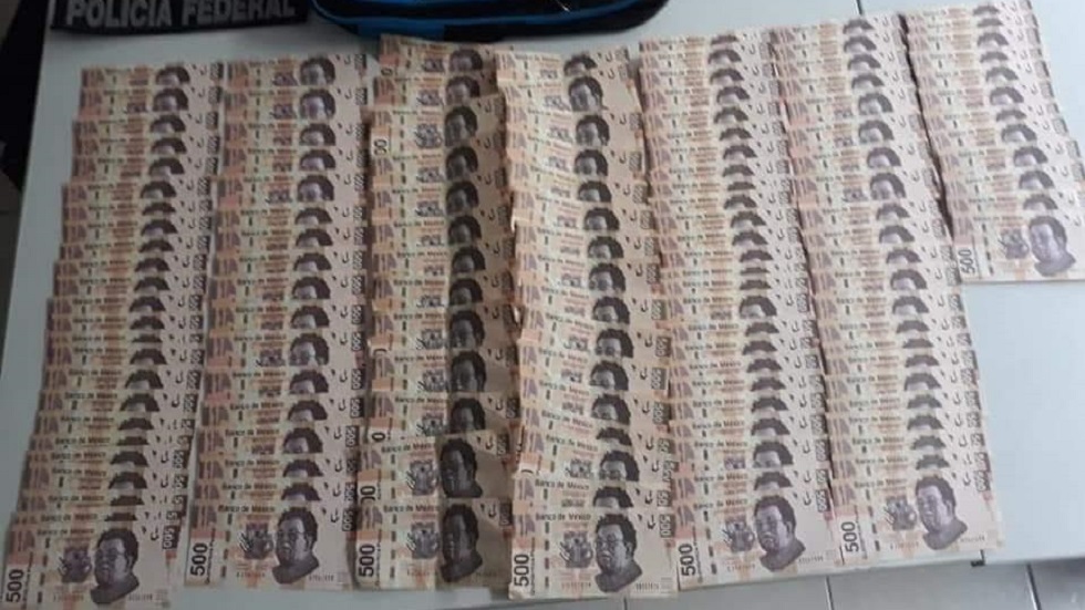 Intentan linchar a tres por intento de estafa en Acapulco - billetes-falsos