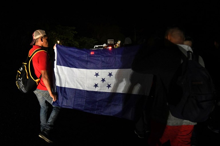 Hondureños parten en nueva caravana migratoria hacia EE.UU. - 000-1c896r