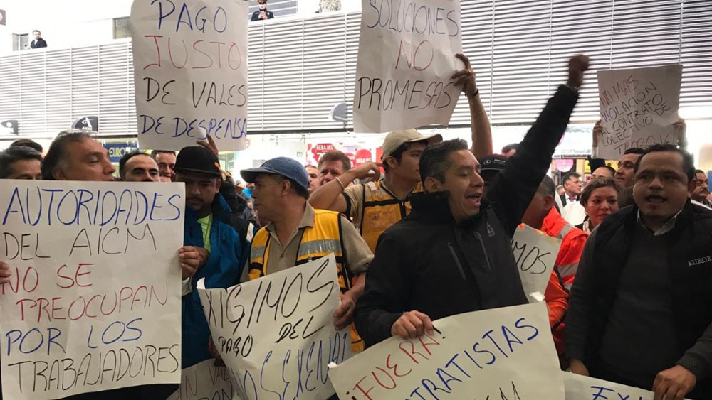 #Video Empleados del AICM logran bono sexenal tras protesta